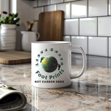 Load image into Gallery viewer, LEAVE GREEN FOOT PRINTS - NOT CARBON ONES   Elegant Eco Friendly Ceramic Tea and Coffee Mug (11oz &amp; 15oz)
